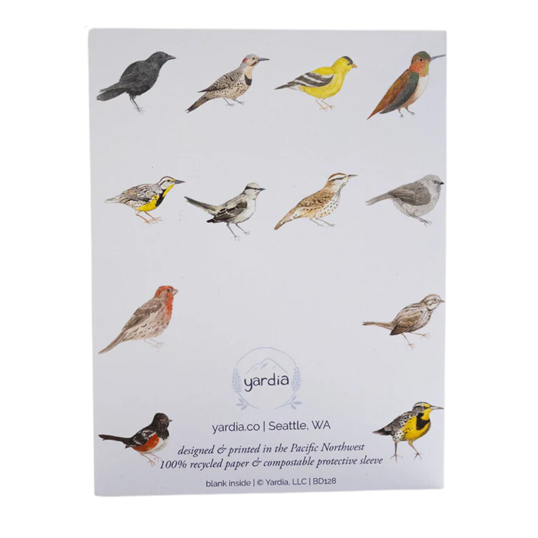 Back of card with several hand painted birds on a white background with the Yardia logo 