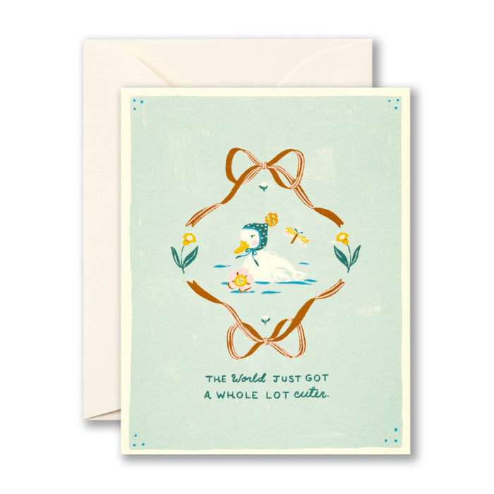 Greeting card with a duck illustration and decorative elements on a light green background.