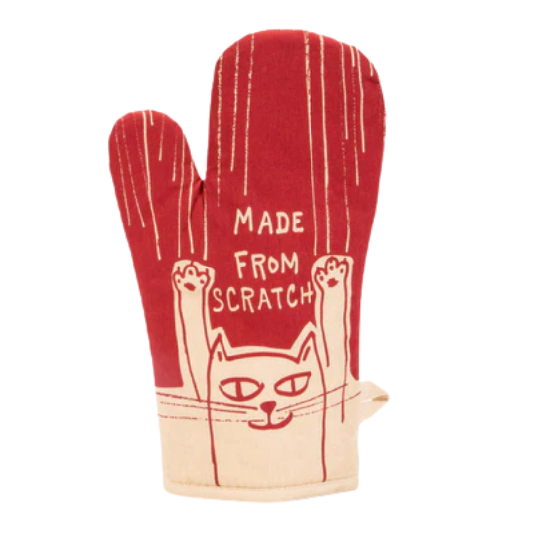 Red oven mitt with a cat design and text that reads "made from Scratch"
on a white background