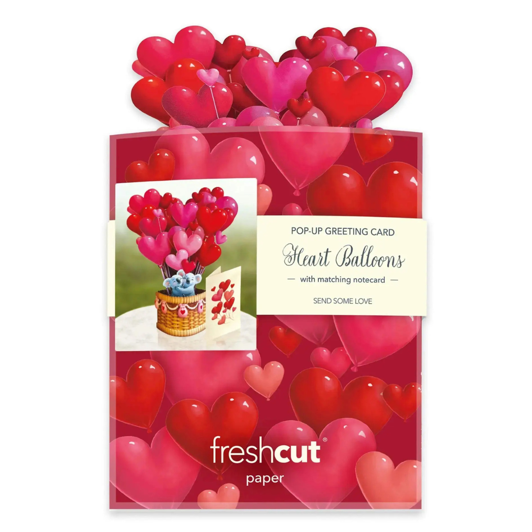 Pop-up greeting card with heart balloons and matching notepad by freshcut paper on a white background