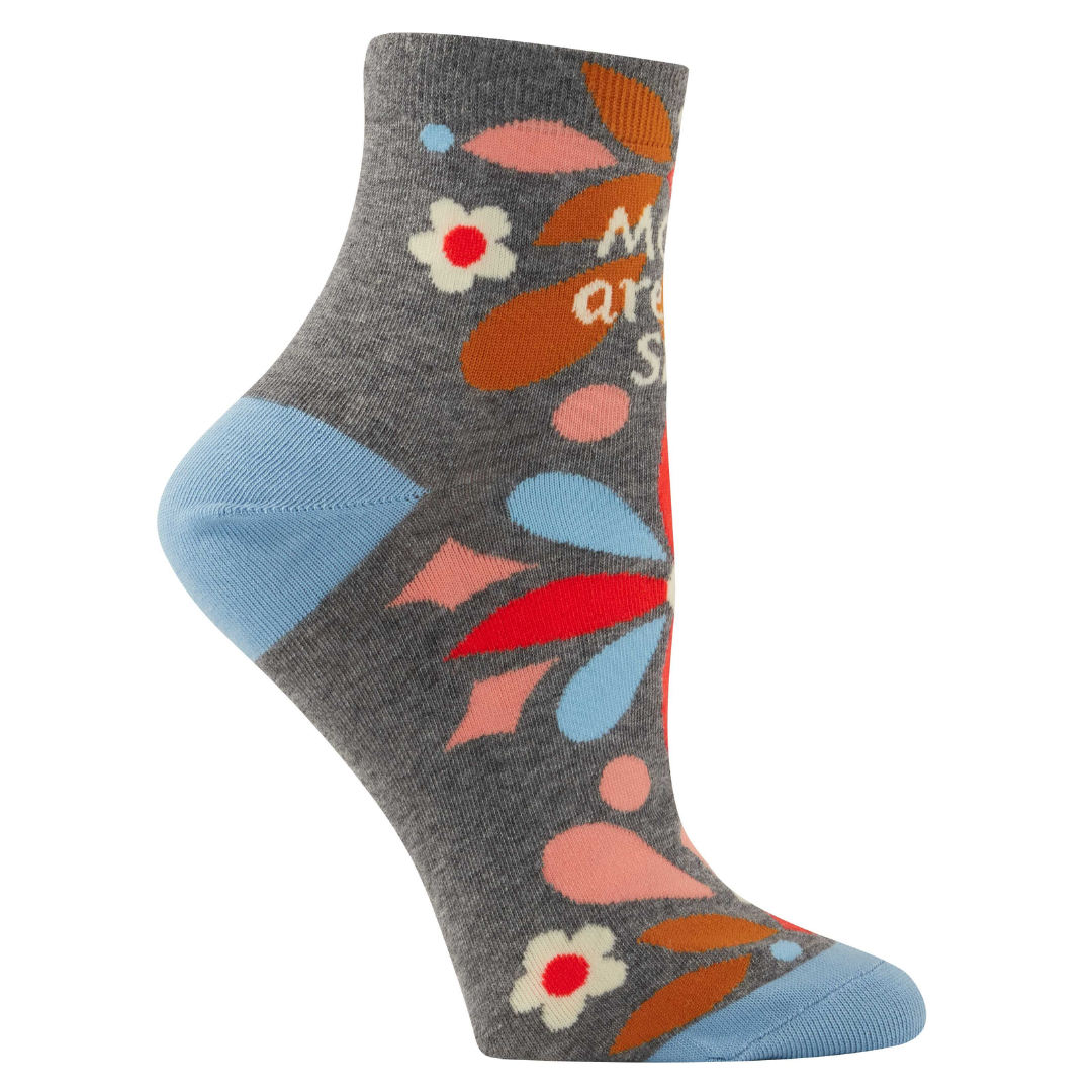 Left side view of "Moms are the shit" socks