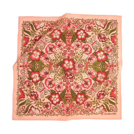 Floral patterned fabric square on a white background