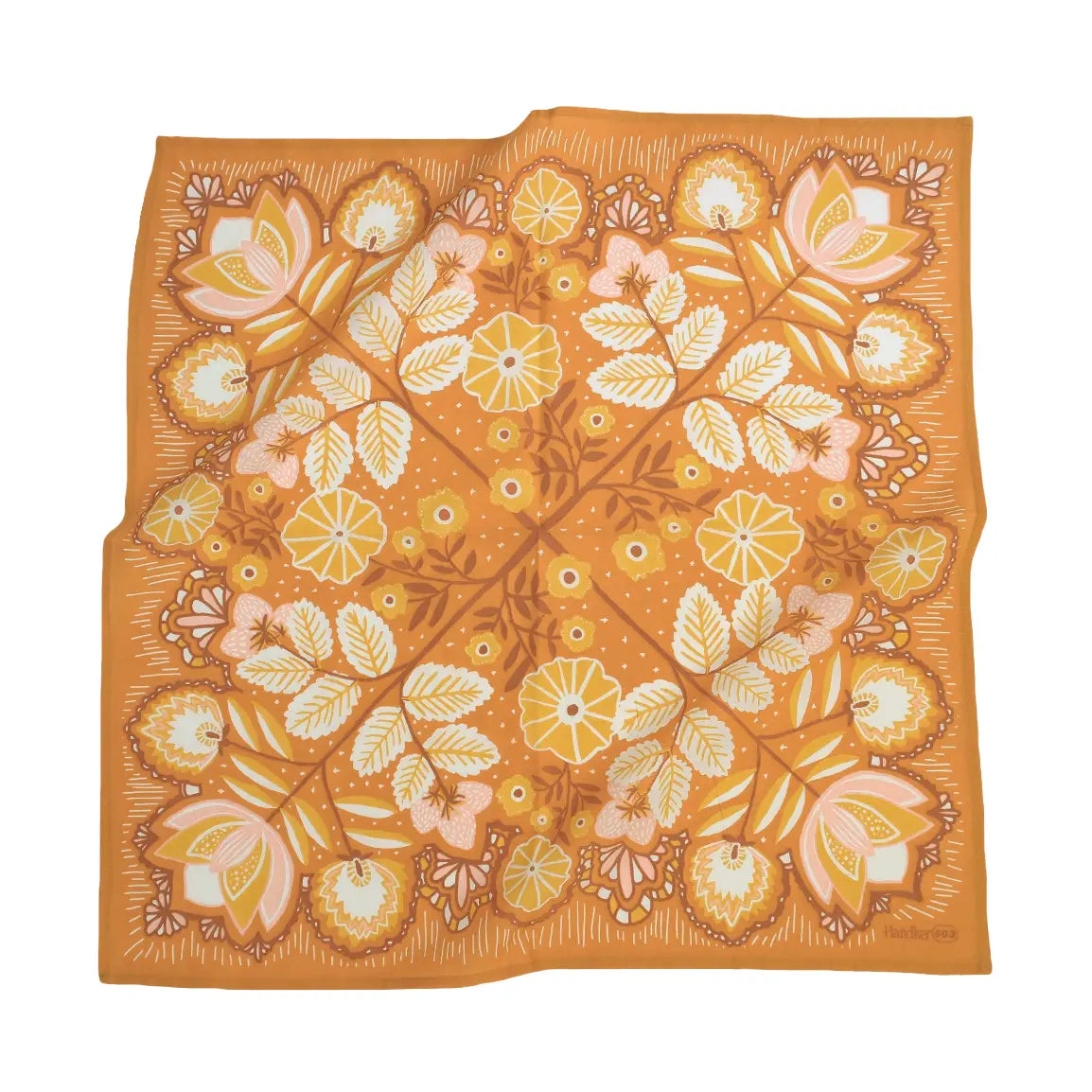 Floral patterned fabric square on a white background