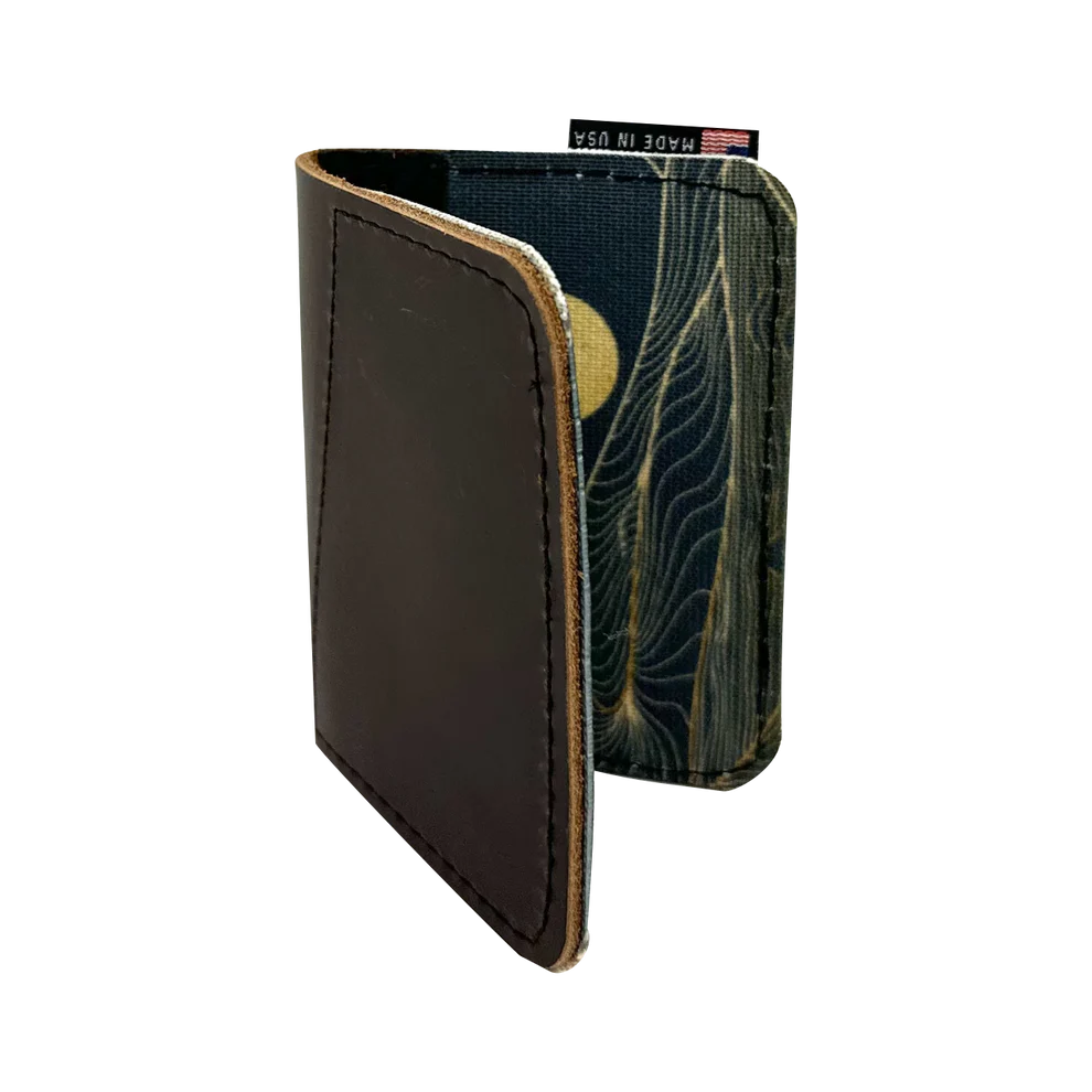 Leather front pocket wallet with  a black dune pattern on the inside pockets