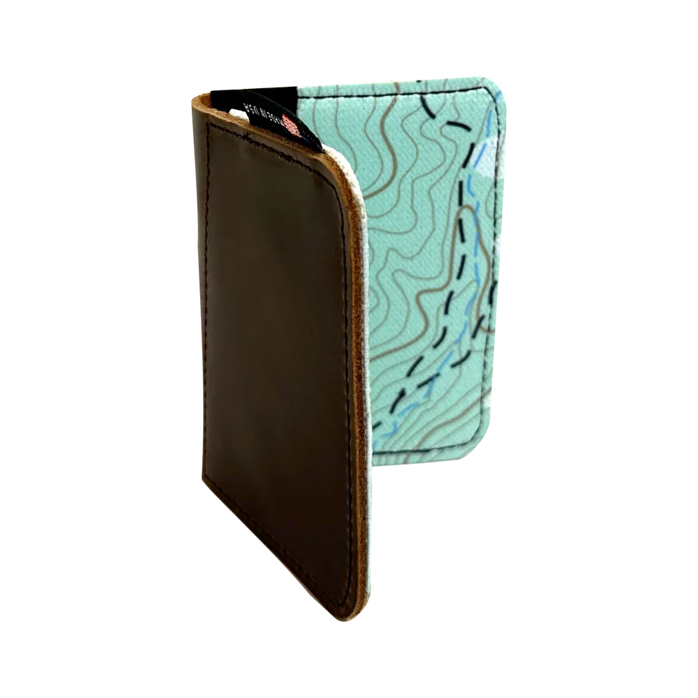 Leather front pocket wallet with a trail map pattern on the inside.