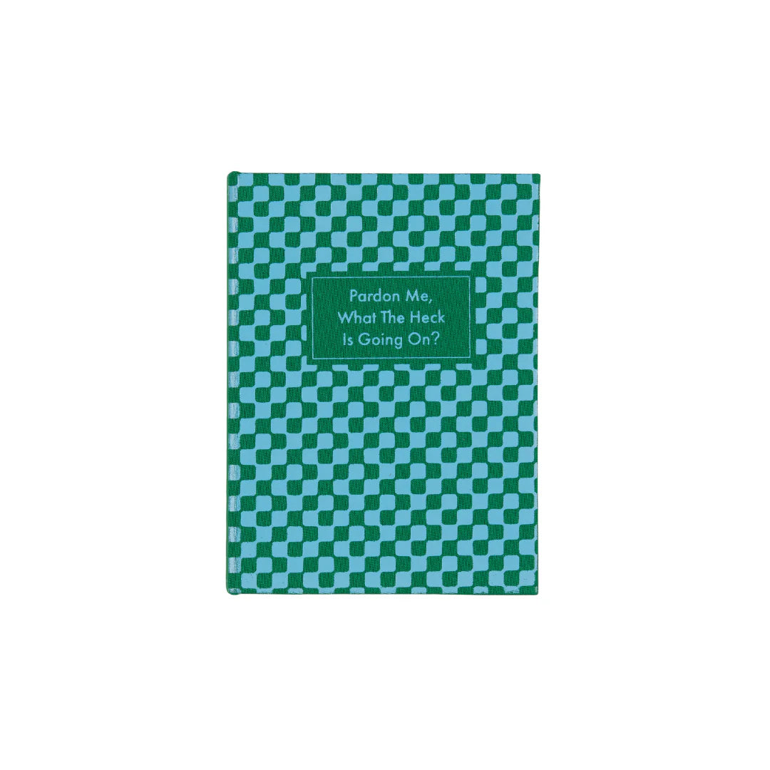 Green checkered notebook with text on a white background