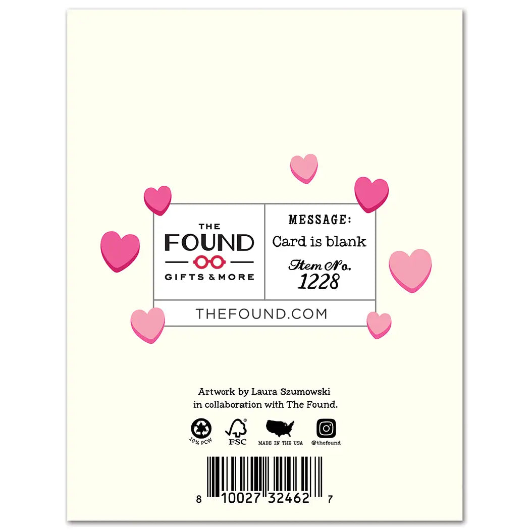 Back of a card with pink hearts and branding information on a light background