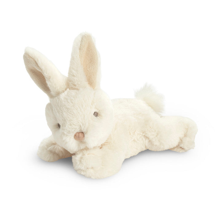 Adorable bunny plush is a soft cream color with embroidered eyes and noes. It lays flat on its belly, ears sticking straight up, ready for adventure