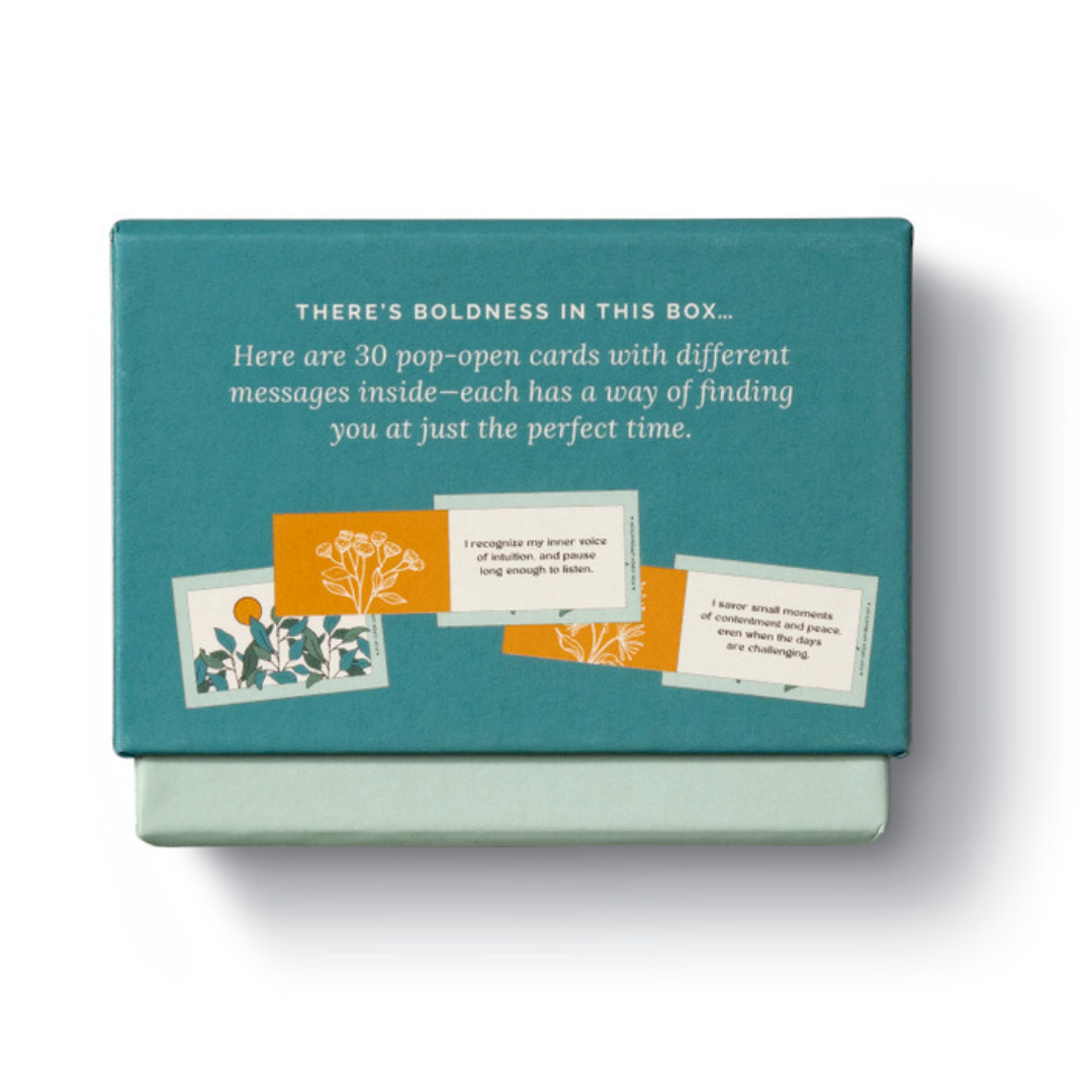 Back of the box features illustrations of the cards and says "There's boldness in this box... Here are 30 pop-open cards with different messages inside- each has a way of finding you at just the perfect time."
