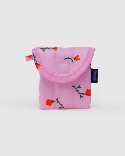Pink earbud pouch with floral pattern on a white background