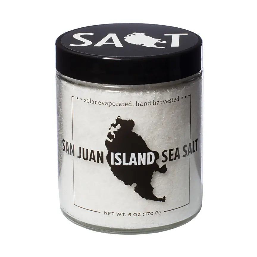 Jar of San Juan Island Sea Salt with black lid and label on a white background