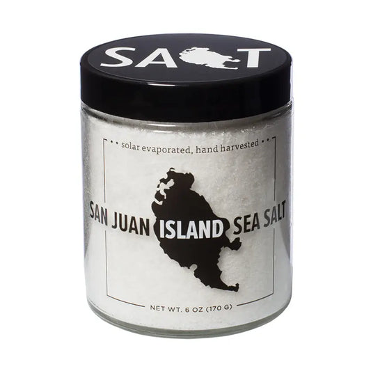 Jar of San Juan Island Sea Salt with black lid and label on a white background
