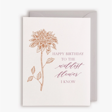 White card with red script text 