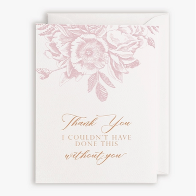 White card and envelope with floral design in pink and orange text.