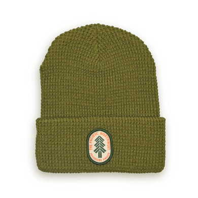 Olive Green beanie with small oval patch on the front that says 