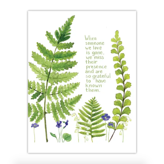 White card with green ferns and small purple flowers. Text reads "When someone we love is gone, we miss their presence and are so grateful to have known them."