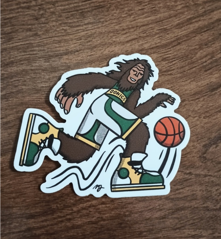 Sticker of Sasquatch dressed in a Super Sonics jersey dribbling a basketball.