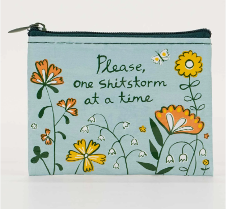 Floral-themed pouch with text on a light blue background