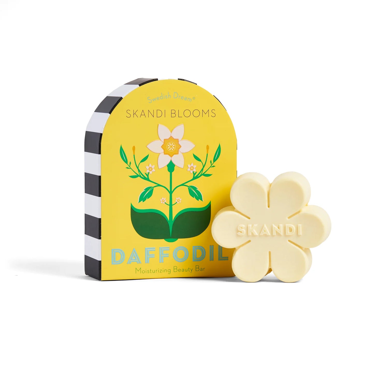 Skandia Blooms Daffodil soap and packaging. Soap is a pale yellow flower and packaging is yellow with a daffodil and black and white striped border.