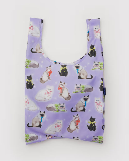 Reusable shopping bag with cat pattern on a purple background
