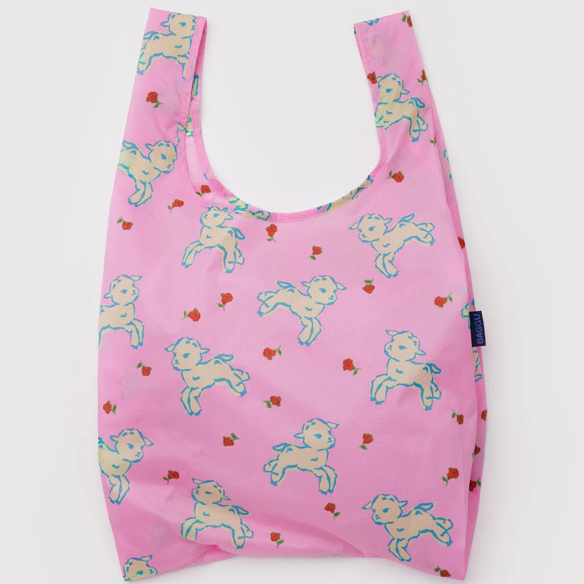 Reusable shopping bag with cute lambs on pink background
