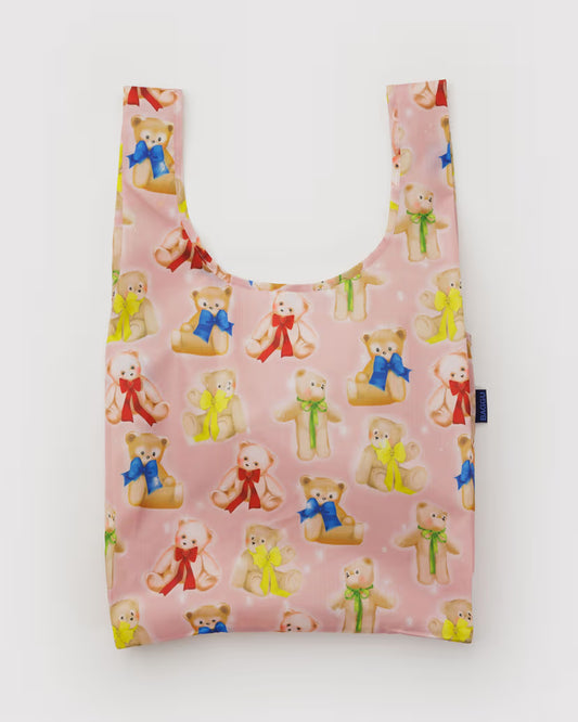 Reusable shopping bag with teddy bear pattern on a pink background