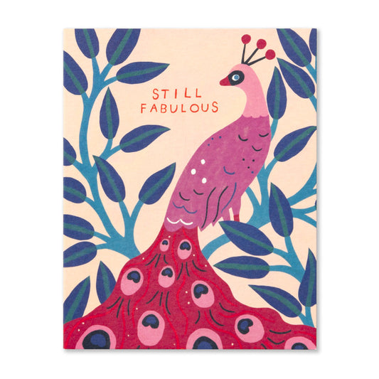 Birthday card with a pink peacock. "Still fabulous"