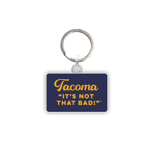 Keychain with "Tacoma It's Not That Bad!" text