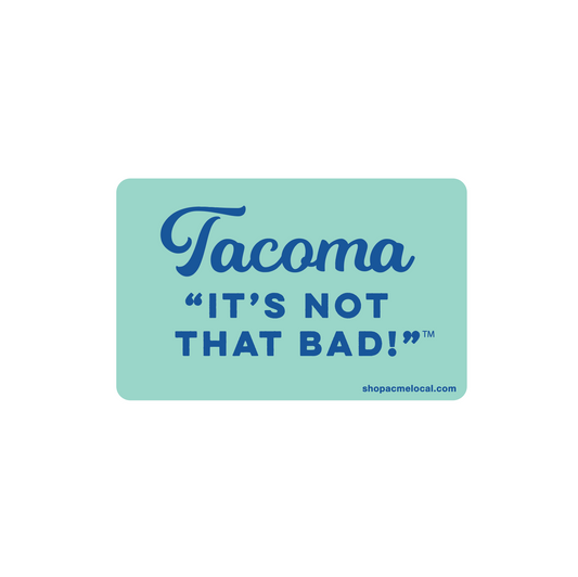 Sticker with 'Tacoma It's Not That Bad!' text on a light blue background