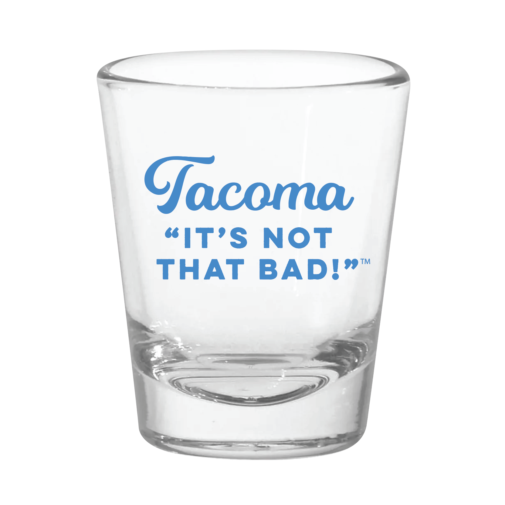 Clear shot glass with blue text 'Tacoma IT'S NOT THAT BAD!' 