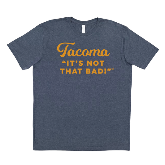 Blue t-shirt with yellow text 'Tacoma It's Not That Bad!' 