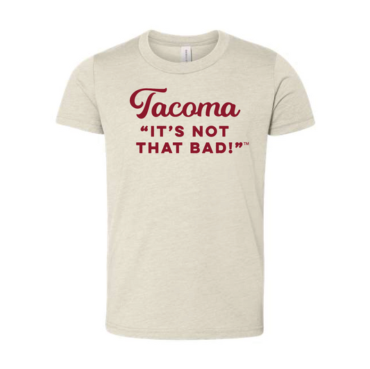 Stone colored t-shirt with red text 'Tacoma IT'S NOT THAT BAD!' 