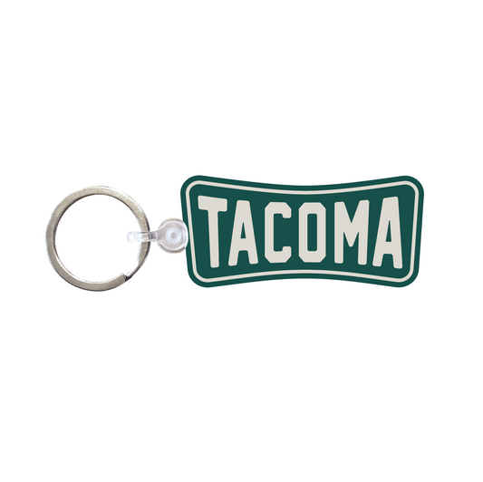 Green keychain with 'Tacoma' text in white