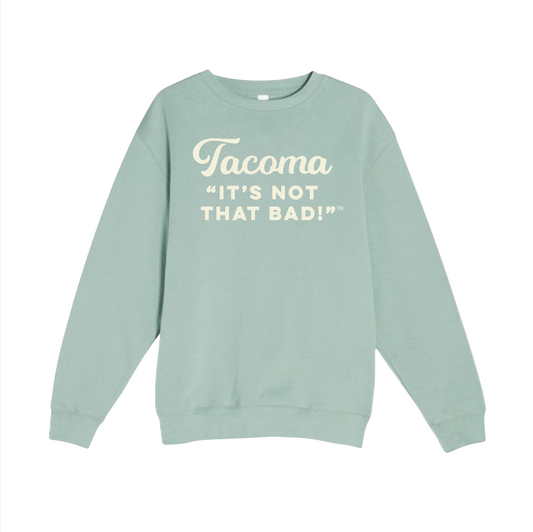 Light blue sweatshirt with 'Tacoma It's Not That Bad!' text on a white background