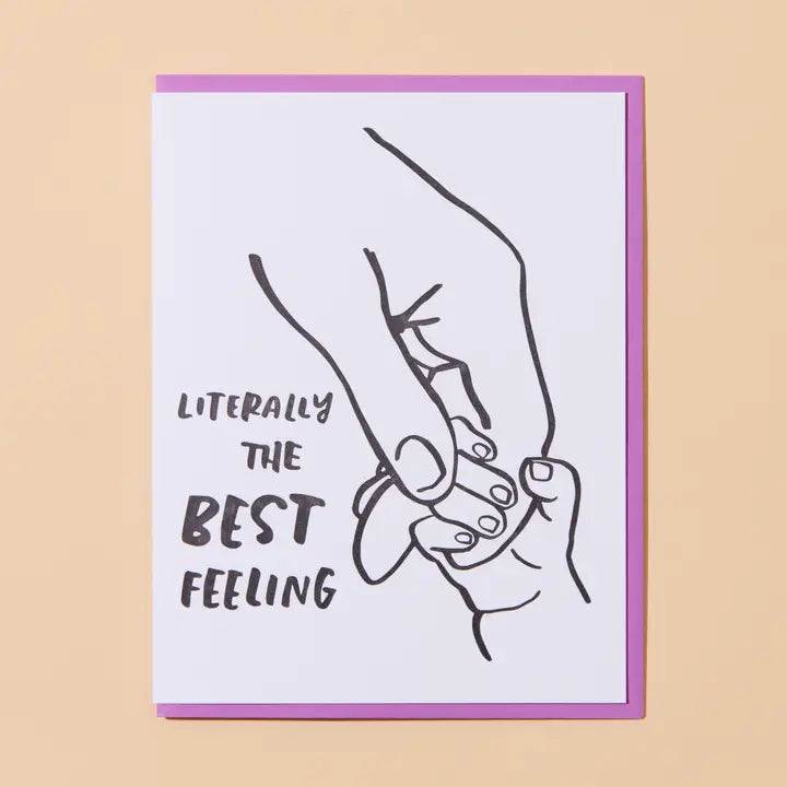 Card with line drawing of two hands holding each other and text 'Literally the best feeling' on a beige background.