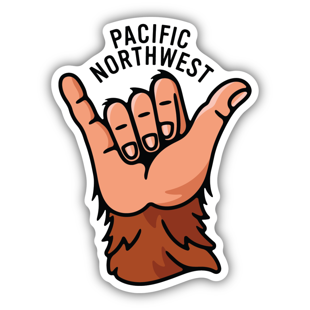 Brown sasquatch hand sticker making a shaka symbol underneath the words "Pacific Northwest".