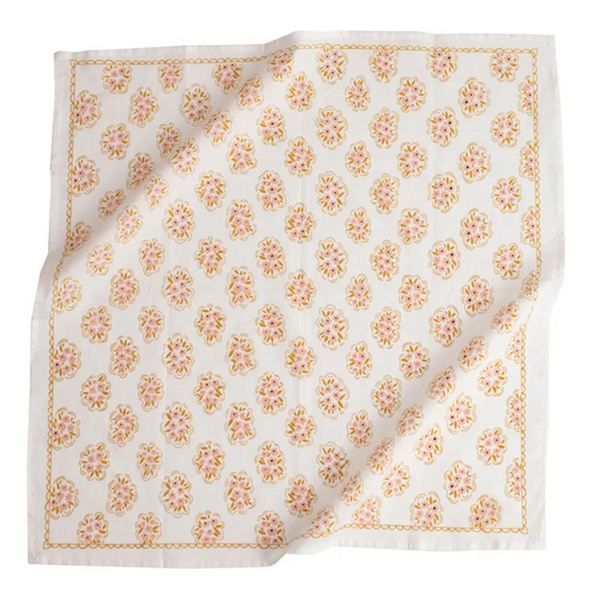 Creamy white based bandana features a pink and gold floral design all over.