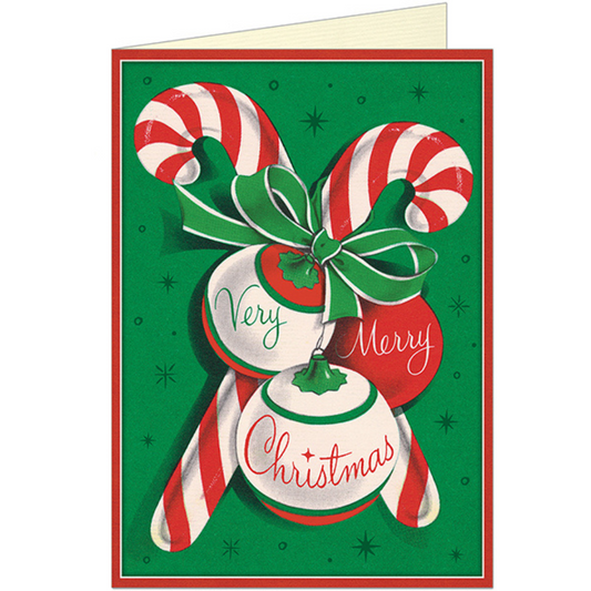 Christmas greeting card with a red border and green background featuring two red & white candy canes crossed over one another tied with a green bow and featuring three bulb ornaments, each with one word on them reading "Very Merry Christmas".