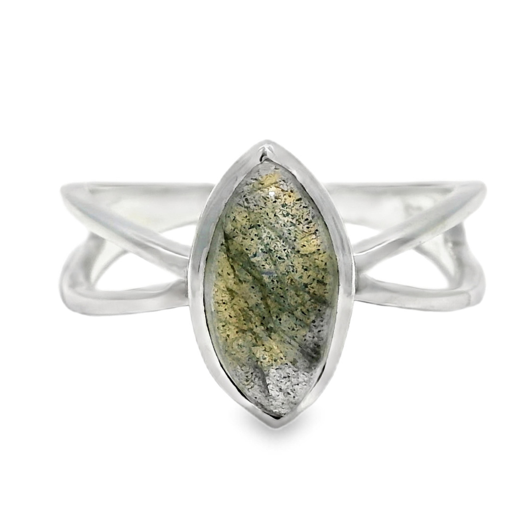 Silver ring featuring two bands that cross over each other and a football shaped stone of yellow and green mixed with a little black and gray.