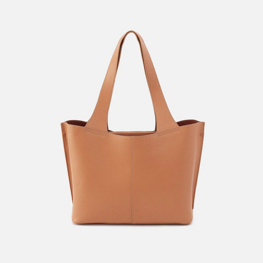 Tan leather shoulder bag with matching tan straps against a white background.