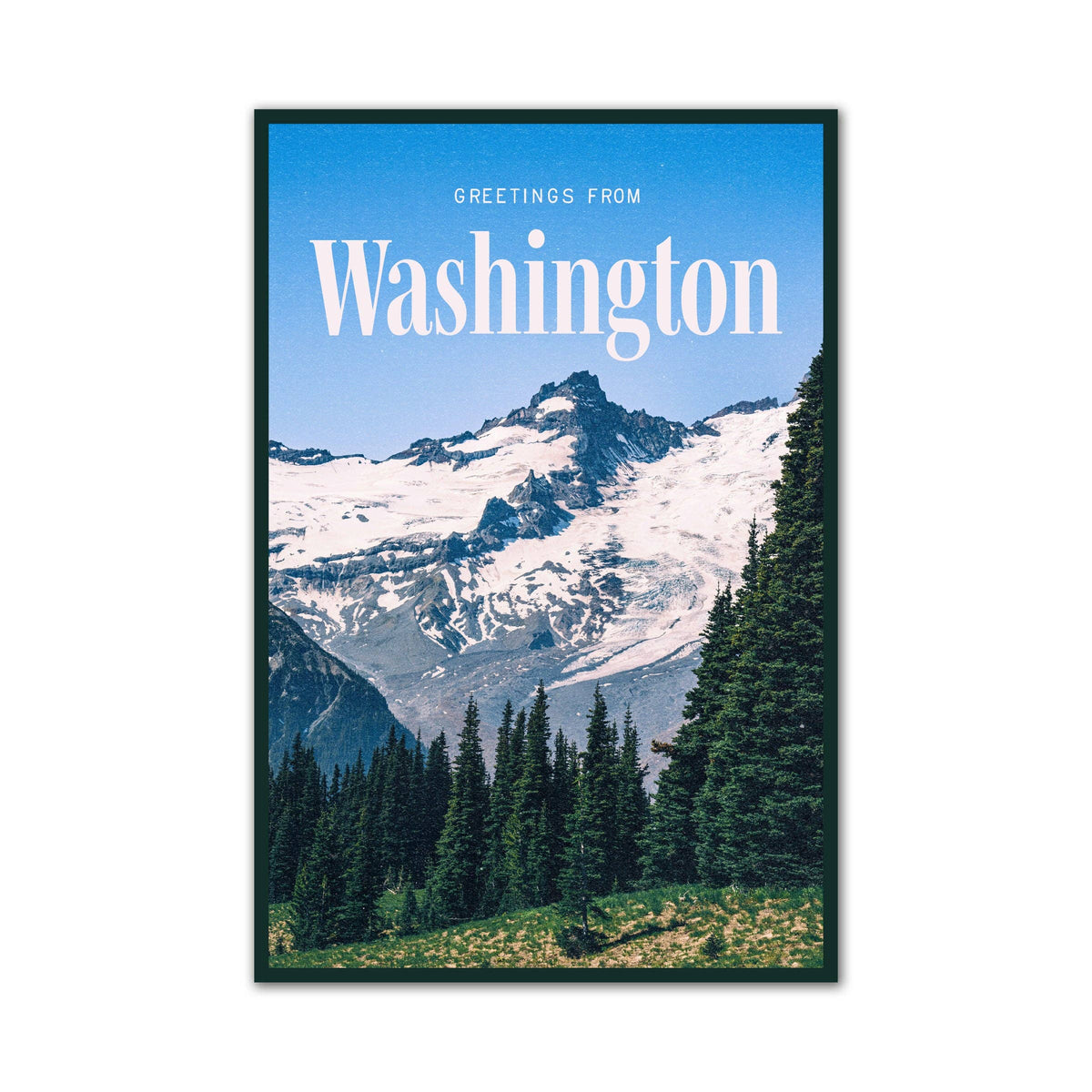 A framed travel-style postcard reading “Greetings From Washington,” showing a snow-covered mountain, blue sky, and evergreen trees, displayed against a light gray background.