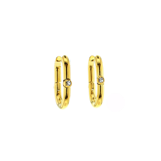 U-shaped gold hoop earrings with a clear gem