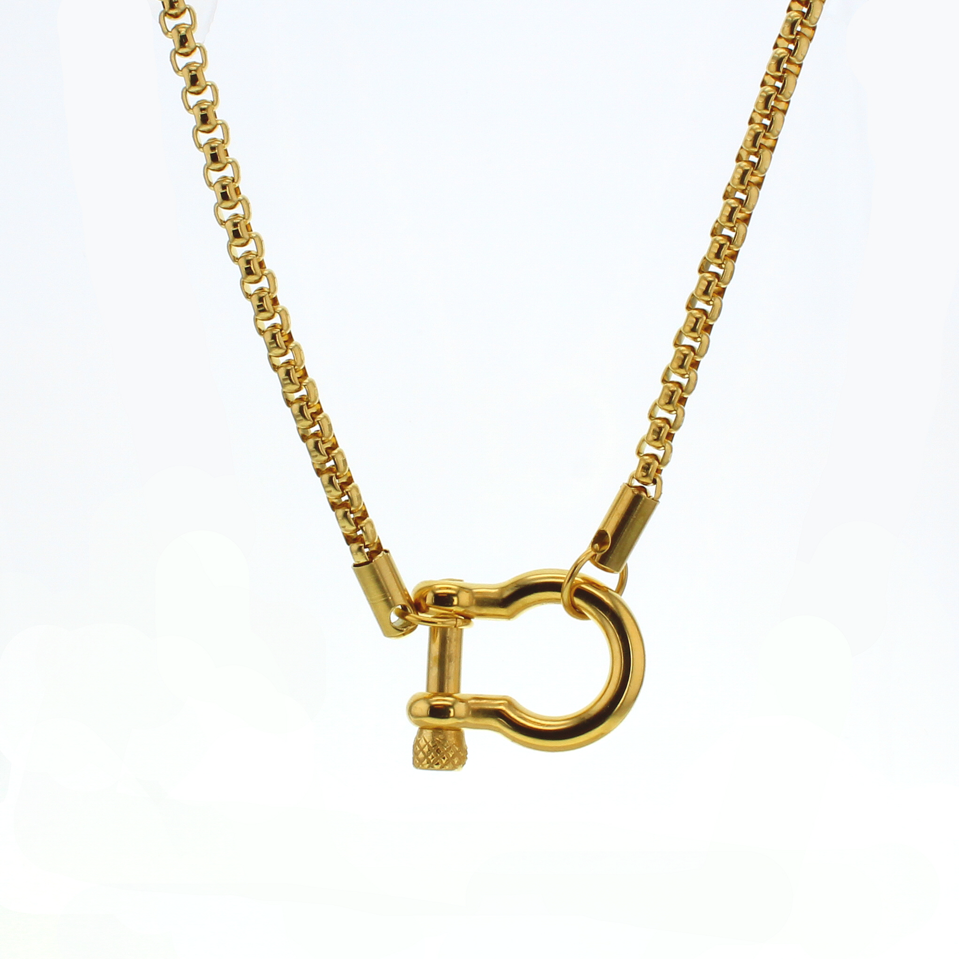 Goldtone necklace with a lock style pendant