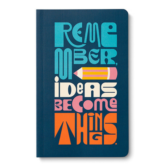 Journal cover- Navy blue with "Remember, ideas become things" in a mod-style font in turquoise, cream, pink, and orange. There's a little pop art style pencil under the word "Remember"