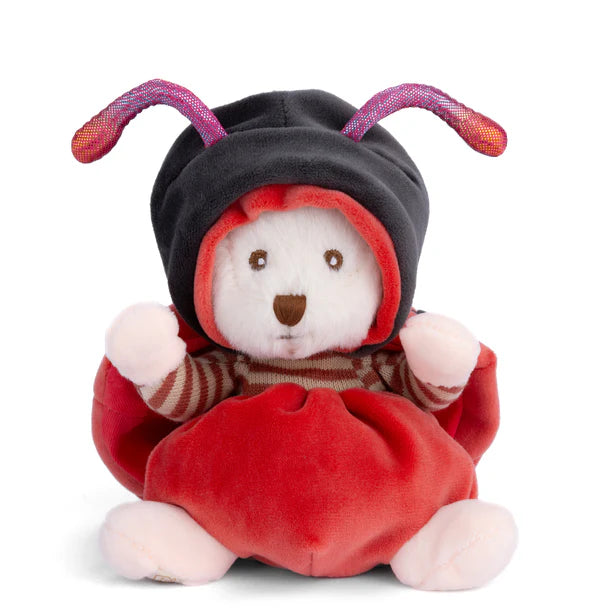 Plush toy bear in a ladybug costume on a white background