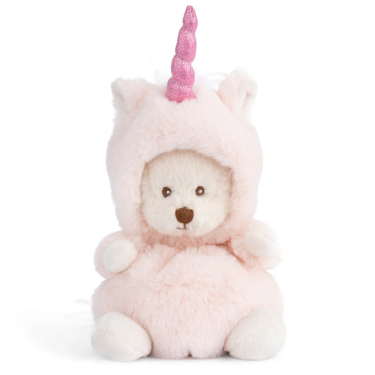 Plush toy bear in a unicorn costume with a pink horn on a white background