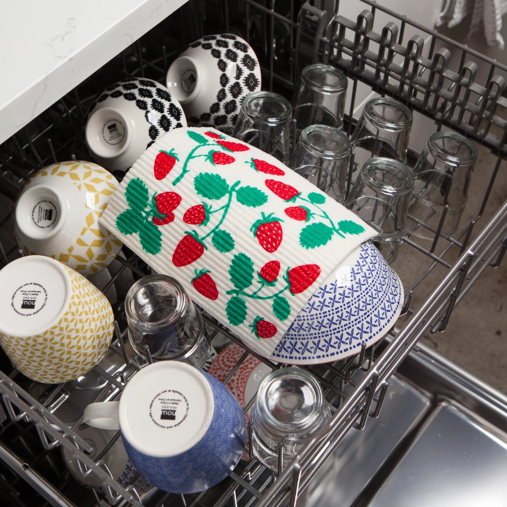 Reusable sponge cloth being cleaned in the dishwasher