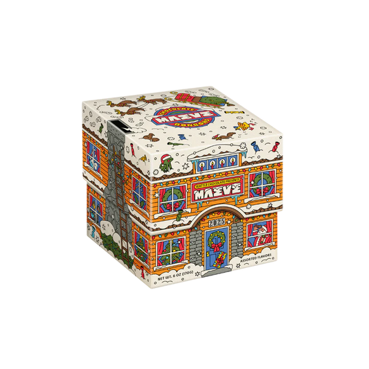 Gift box of chocolates decorated like a cute 2 story building dressed for the holidays