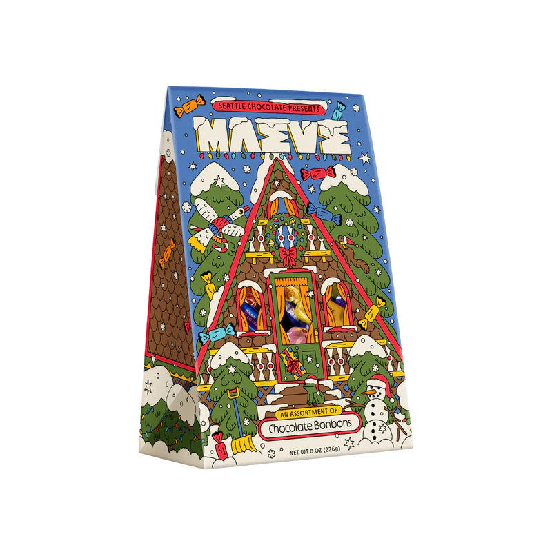 Festive packaging for Maeve Chocolates gift box looks like an A-frame house ready for the holidays