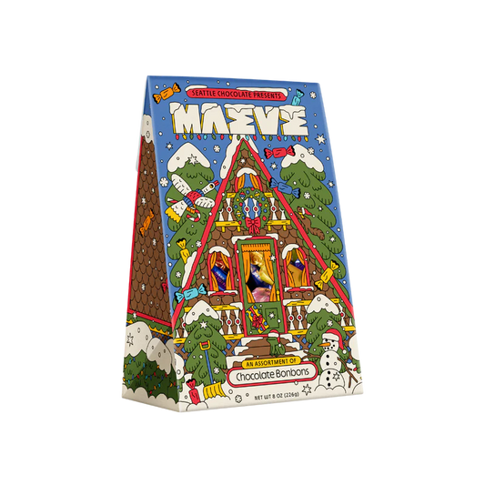 Festive packaging for Maeve Chocolates gift box looks like an A-frame house ready for the holidays